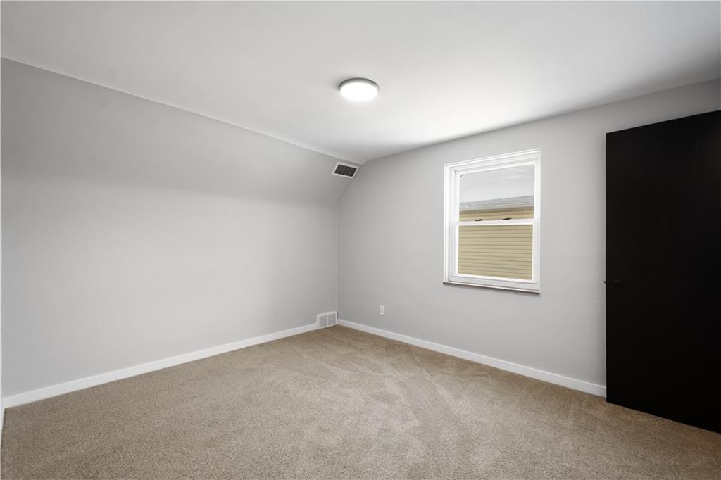 1613 Clarkton Street Pittsburgh, PA 15204 - Photo 15 of 23 an empty room with windows