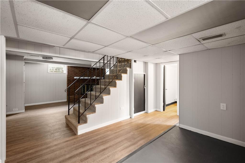1613 Clarkton Street Pittsburgh, PA 15204 - Photo 18 of 23 a view of a room with wooden floor