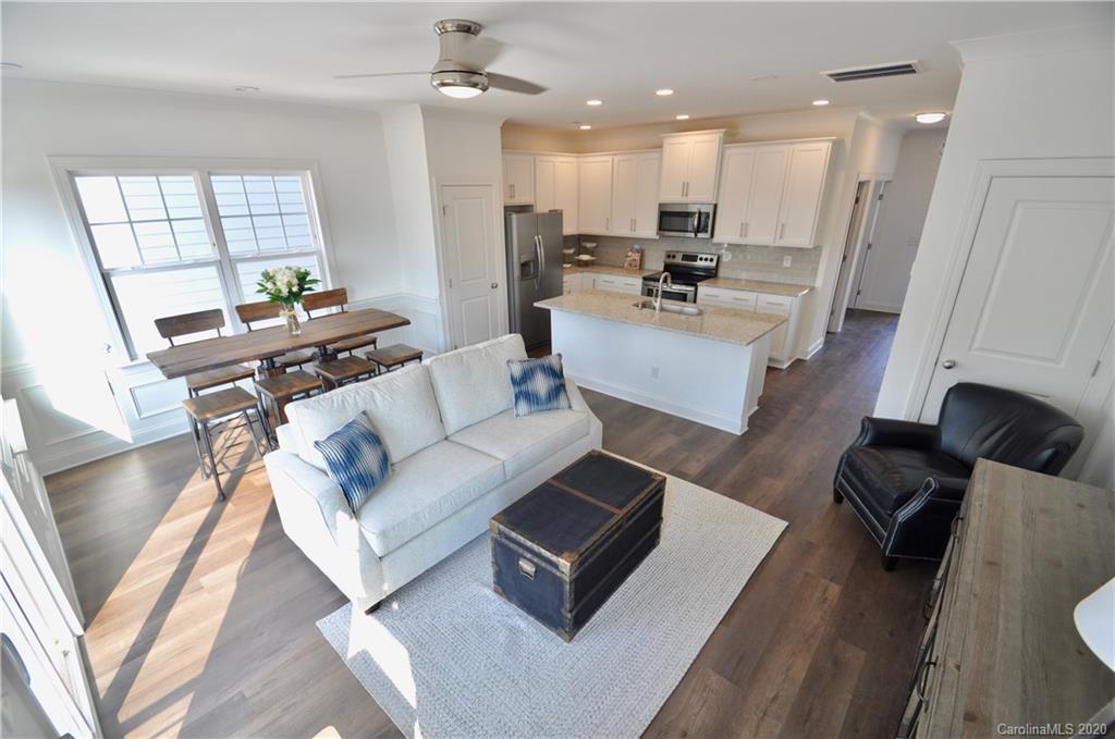 235 Keener Boulevard Belmont, NC 28012 - Photo 5 of 29 a living room with furniture and a wooden floor