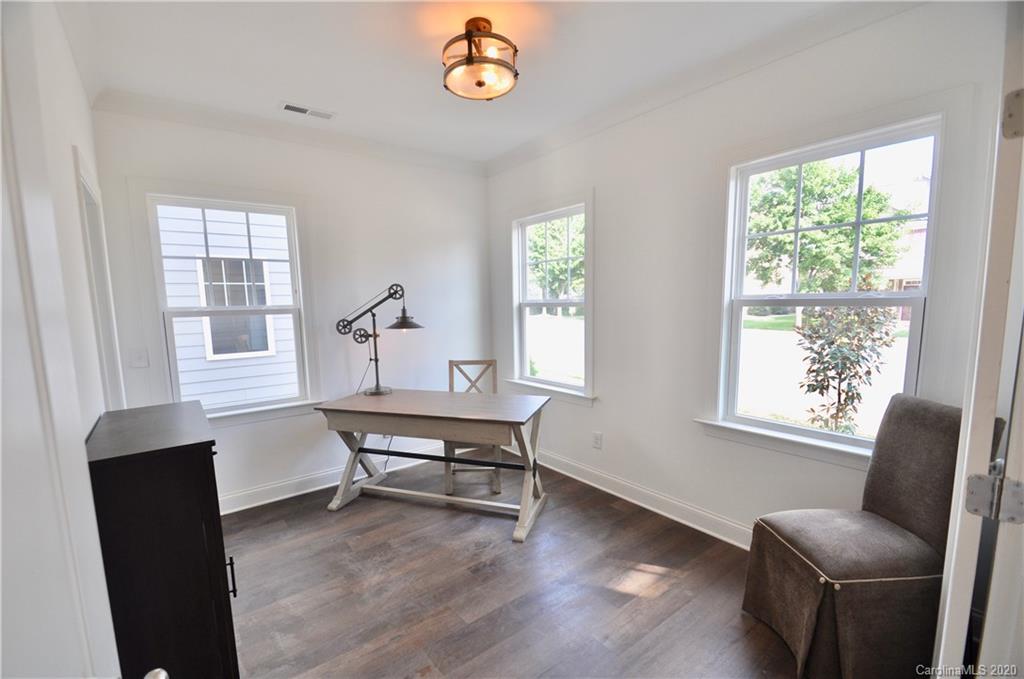 235 Keener Boulevard Belmont, NC 28012 - Photo 8 of 29 a living room with furniture and a window