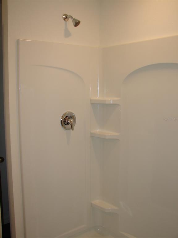 136 Sea Trail Palm Coast, FL 32164 - Photo 15 of 29 a close up of a shower