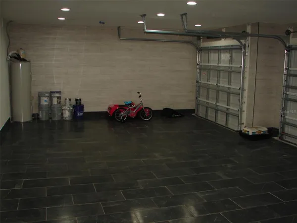 a living room with flat screen tv and outdoor space