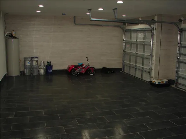 a living room with flat screen tv and outdoor space