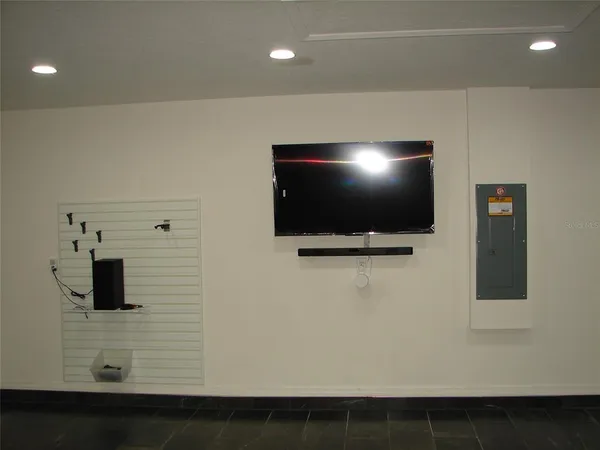 a view of a field with a tree