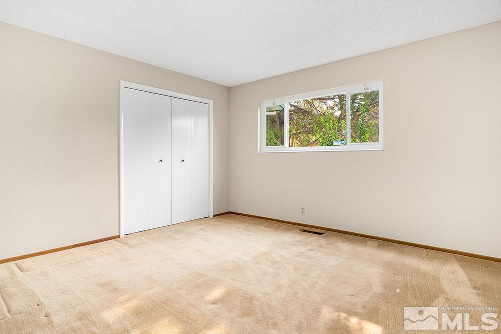 2120 Dant Boulevard Reno, NV 89509 - Photo 29 of 33 an empty room with a window