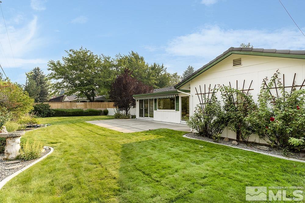 2120 Dant Boulevard Reno, NV 89509 - Photo 8 of 33 a view of a house with pool and a yard