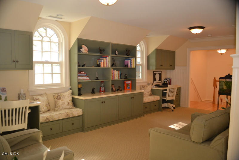15 Palmer Terrace Riverside, CT 06878 - Photo 14 of 22 a living room with furniture and a window
