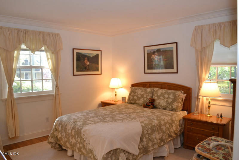 15 Palmer Terrace Riverside, CT 06878 - Photo 18 of 22 a bedroom with a bed and window