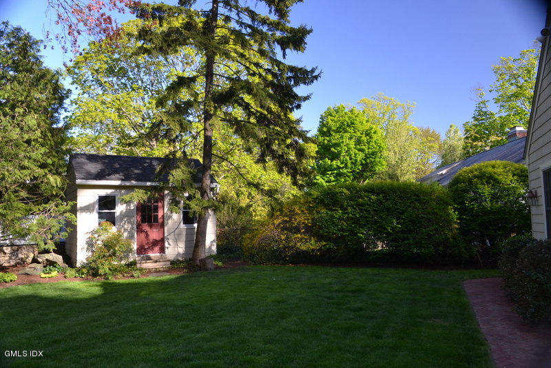 15 Palmer Terrace Riverside, CT 06878 - Photo 20 of 22 a view of a house with a backyard