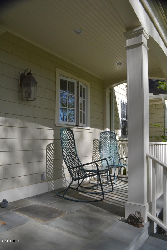 15 Palmer Terrace Riverside, CT 06878 - Photo 21 of 22 a view of a balcony with furniture