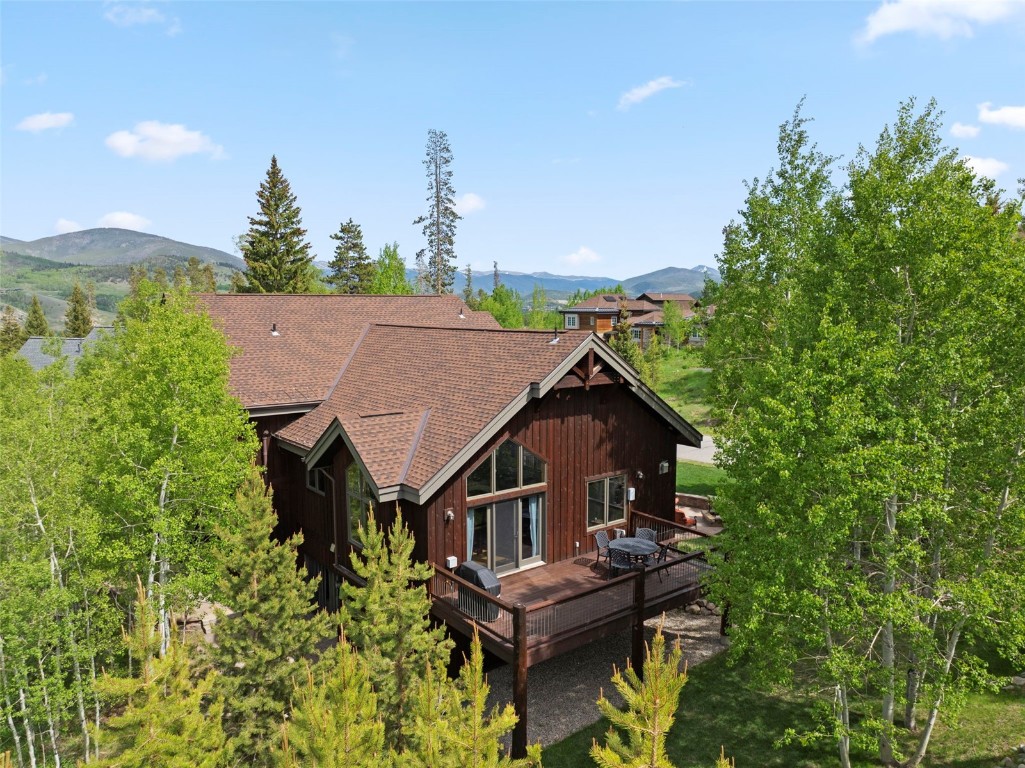 736 Wild Rose Road Silverthorne, CO 80498 - Photo 14 of 49 a aerial view of a house with swimming pool next to a yard