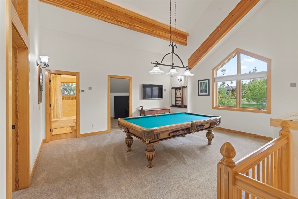 736 Wild Rose Road Silverthorne, CO 80498 - Photo 21 of 49 a room with pool table and windows