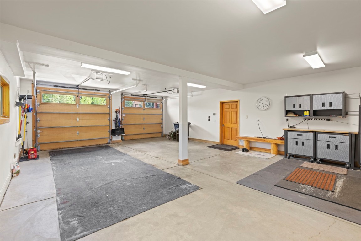 736 Wild Rose Road Silverthorne, CO 80498 - Photo 47 of 49 a bedroom with furniture and a window