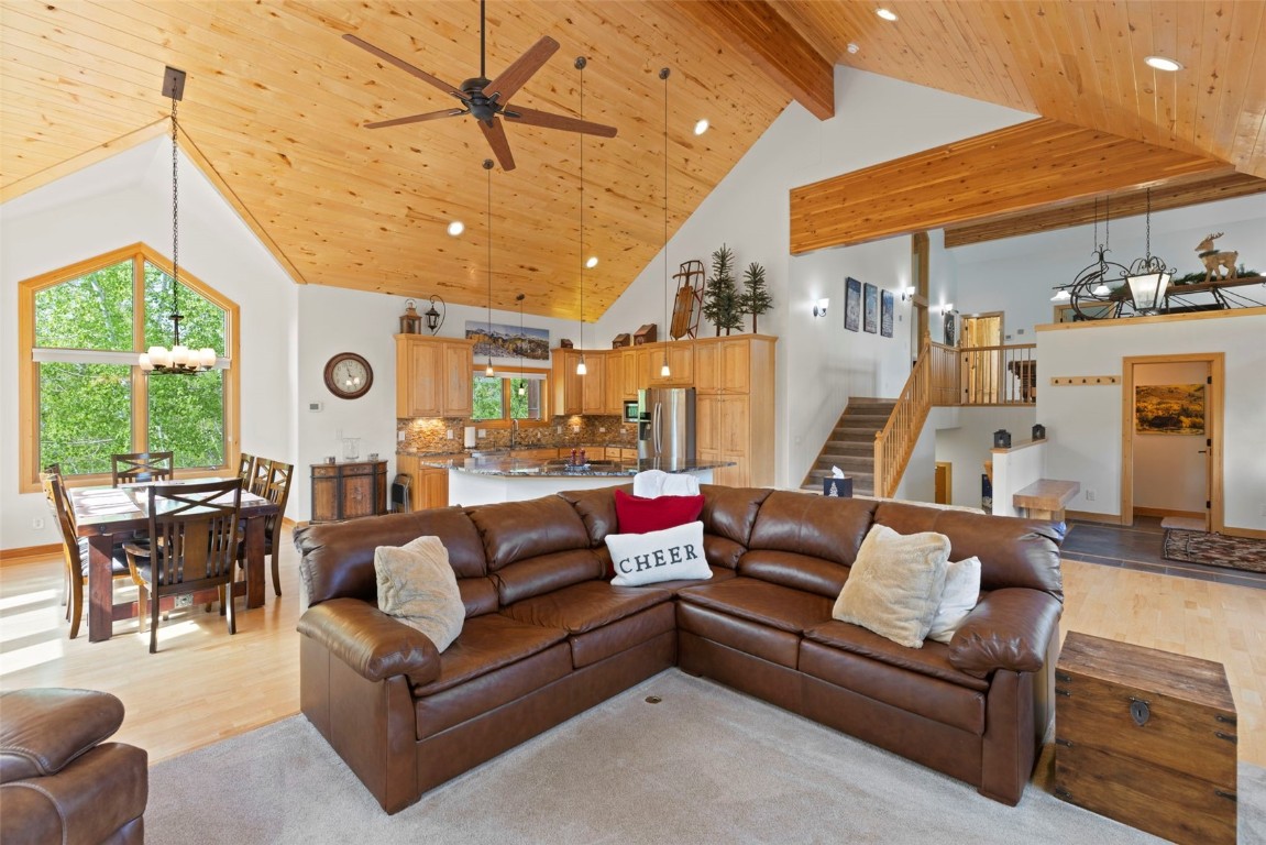 736 Wild Rose Road Silverthorne, CO 80498 - Photo 6 of 49 a living room with furniture and a large window