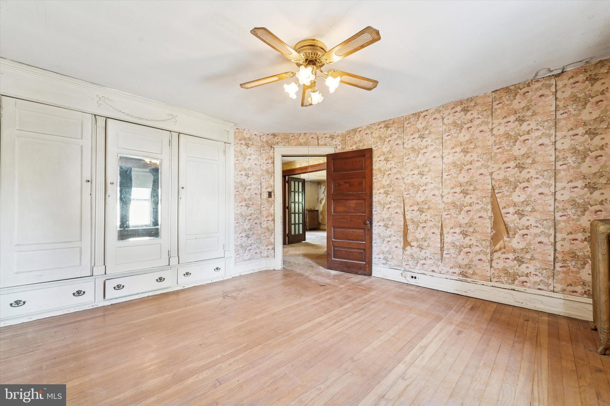 2546 North Broad Street Colmar, PA 19446 - Photo 15 of 25 wooden floor in an empty room with a window