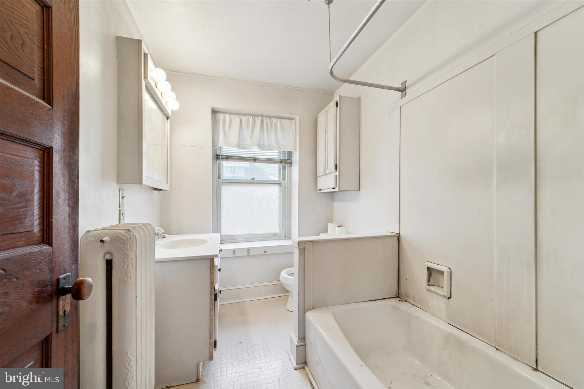 2546 North Broad Street Colmar, PA 19446 - Photo 18 of 25 a bathroom with a tub a sink and a shower