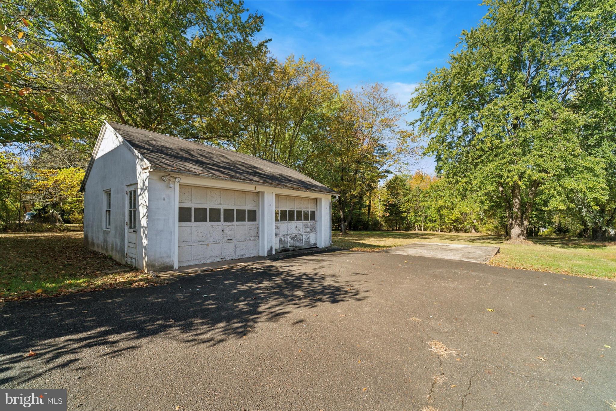 2546 North Broad Street Colmar, PA 19446 - Photo 24 of 25 a front view of a house with a yard