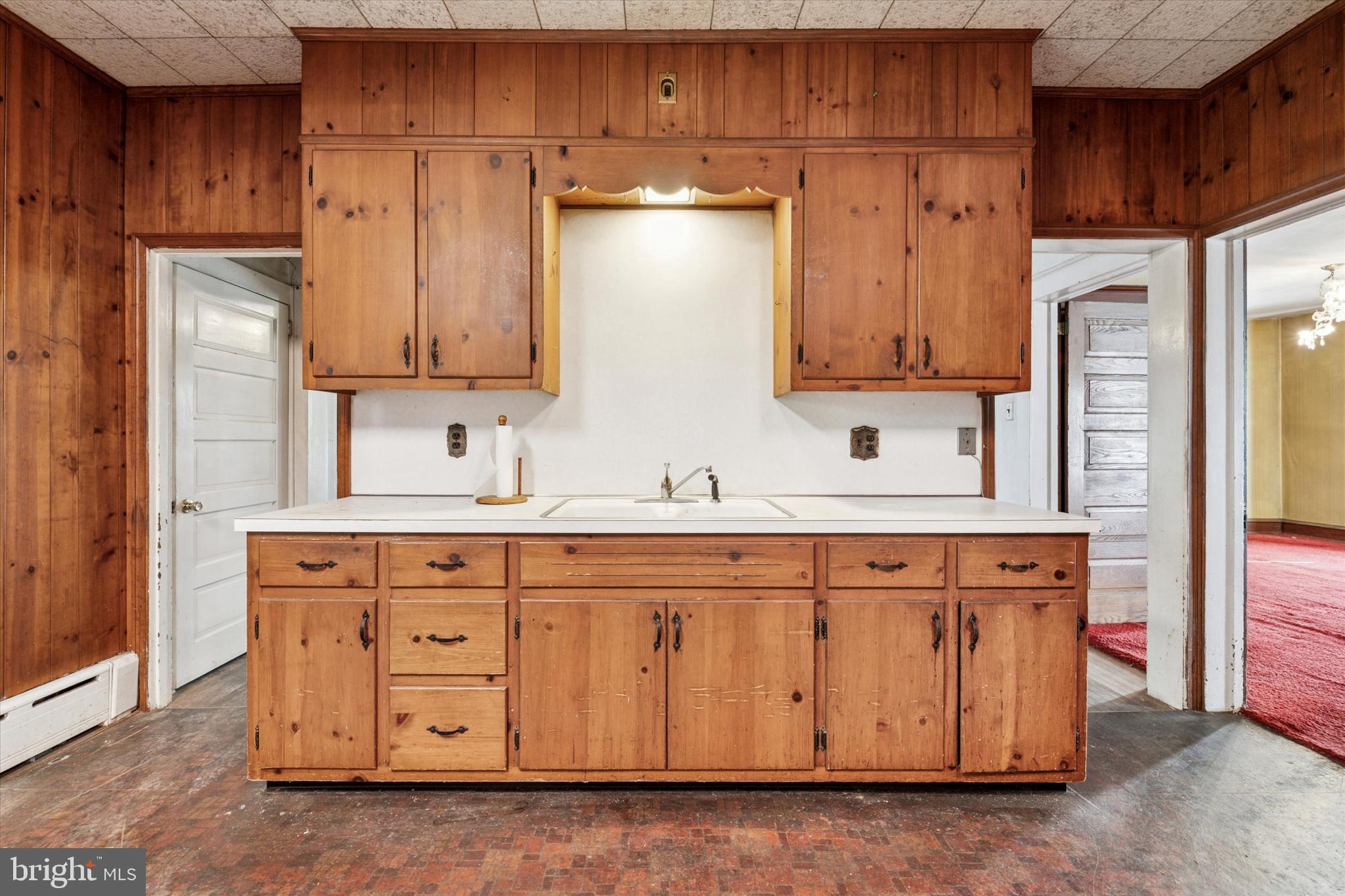 2546 North Broad Street Colmar, PA 19446 - Photo 7 of 25 a kitchen with stainless steel appliances granite countertop a sink stove and cabinets