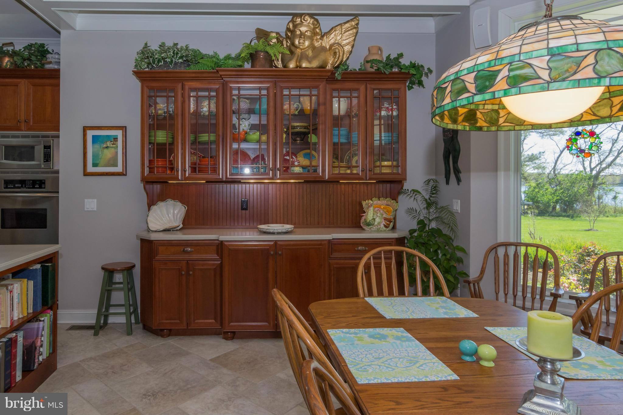 8092 Church Neck Road St. Michaels, MD 21663 - Photo 13 of 27 a view of a dining room and furniture window and outside view
