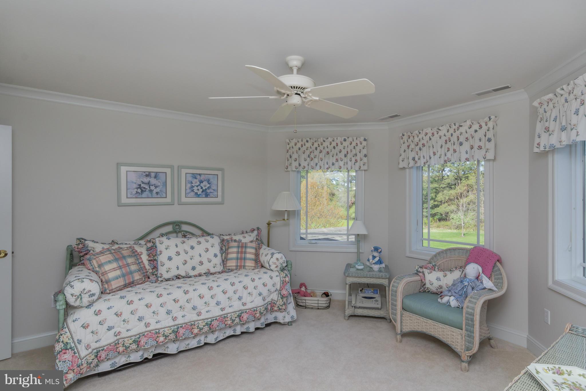 8092 Church Neck Road St. Michaels, MD 21663 - Photo 17 of 27 a living room with furniture and a window