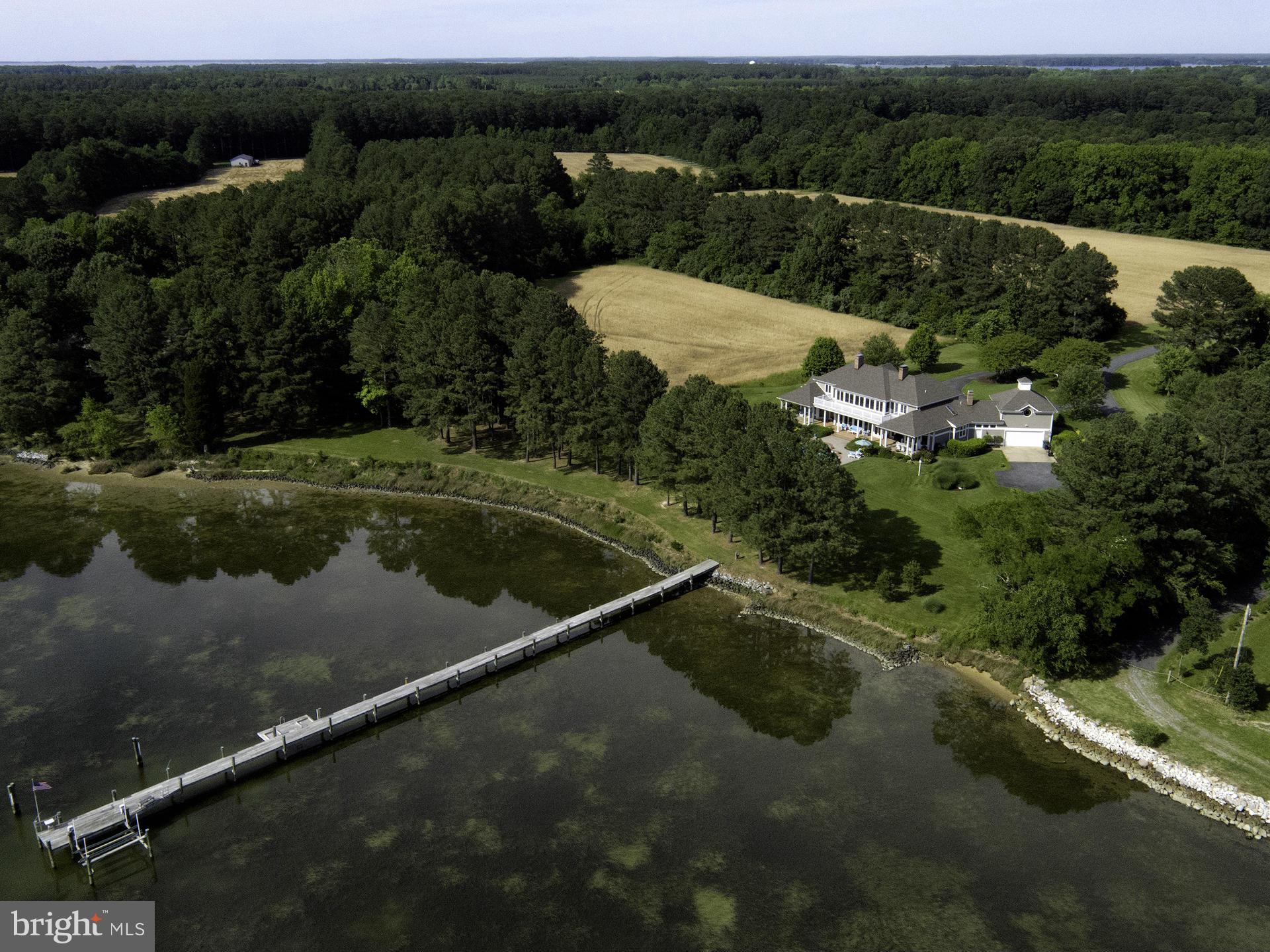 8092 Church Neck Road St. Michaels, MD 21663 - Photo 26 of 27 an aerial view of a house with a yard