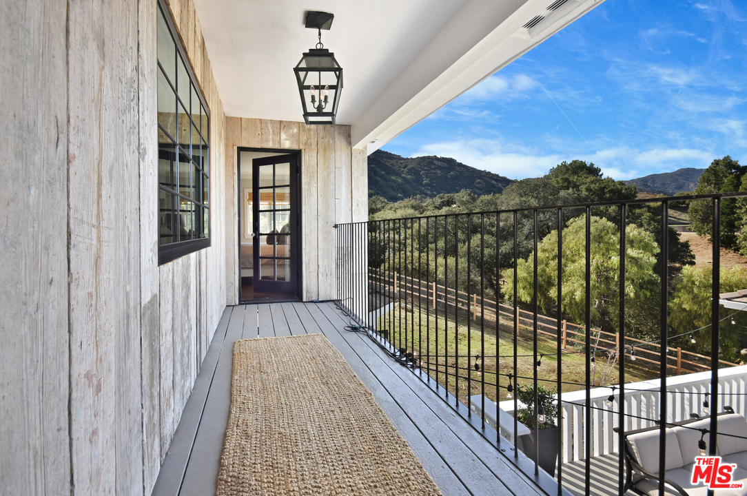 560 Cold Canyon Road Calabasas, CA 91302 - Photo 29 of 38 a view of balcony with furniture