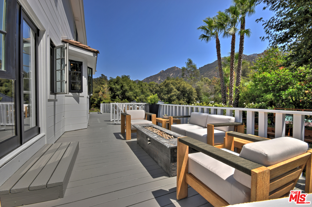 560 Cold Canyon Road Calabasas, CA 91302 - Photo 35 of 38 a view of balcony with furniture