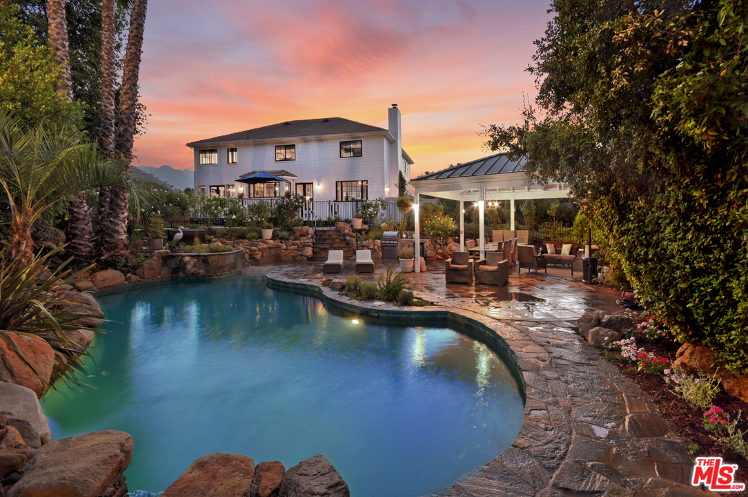 560 Cold Canyon Road Calabasas, CA 91302 - Photo 38 of 38 a view of a swimming pool with a patio