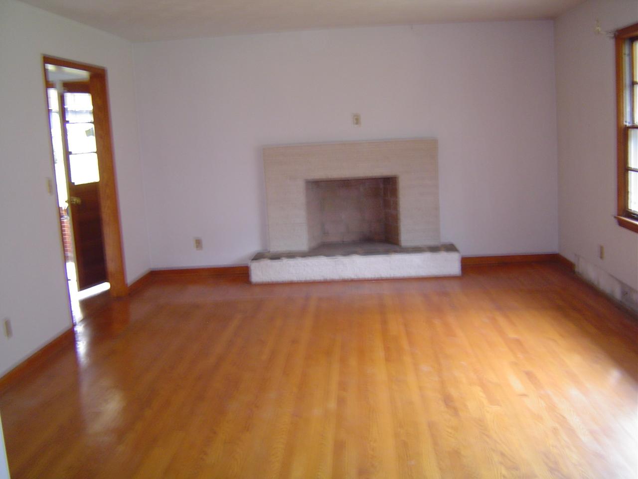410 Brake Road Elliston, VA 24087 - Photo 6 of 14 a view of empty room with wooden floor and fan