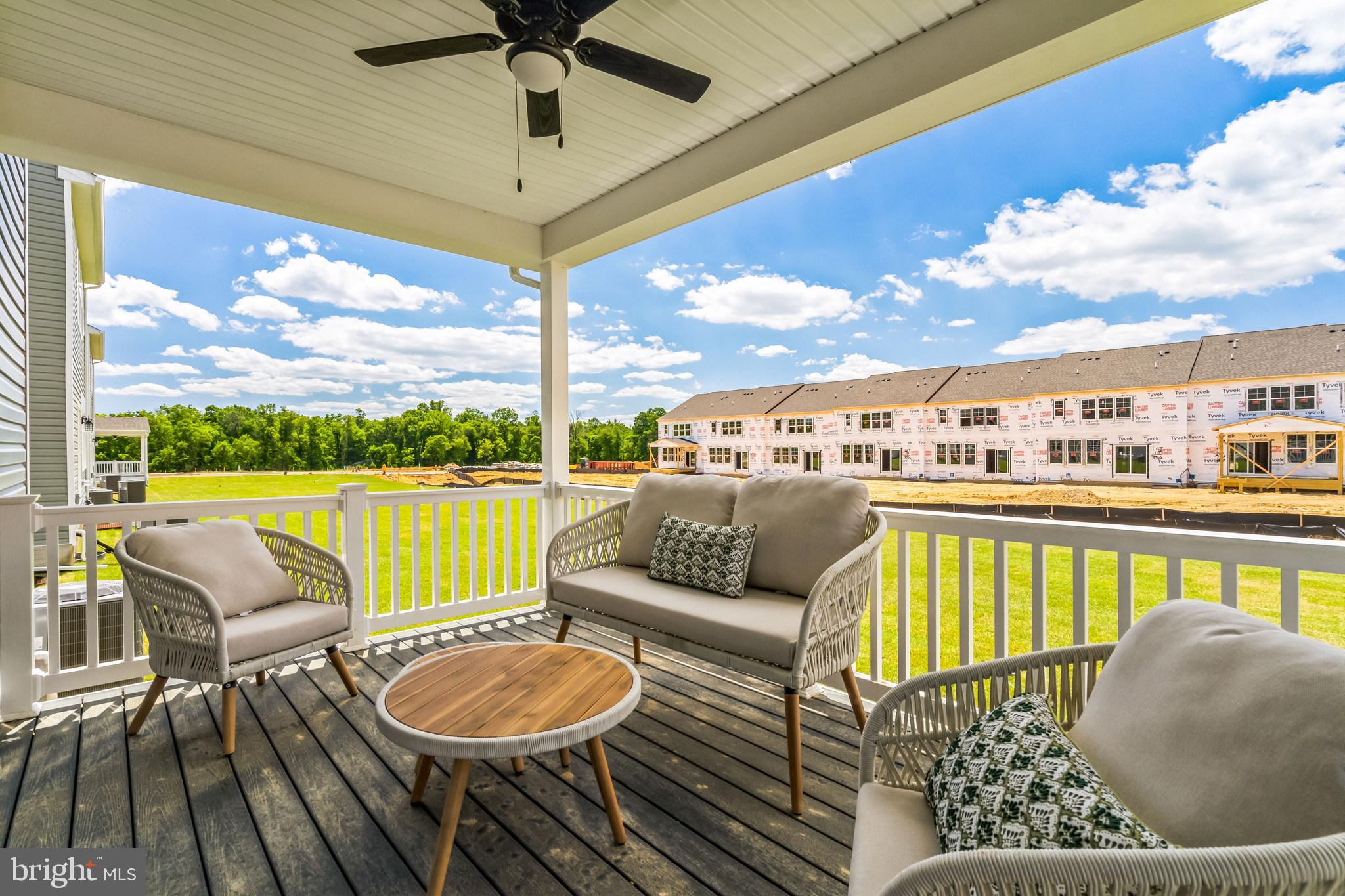726 Aldora Drive Aberdeen, MD 21001 - Photo 20 of 35 a balcony with furniture and a view of lake