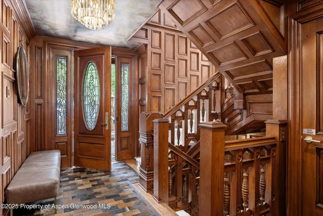 a view of front door with stairs