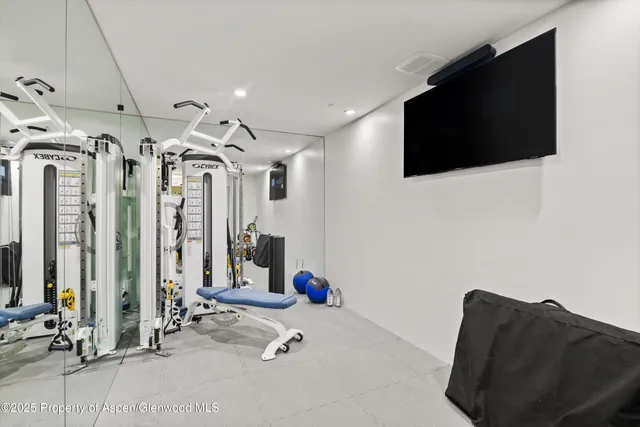 a view of a room with gym equipment
