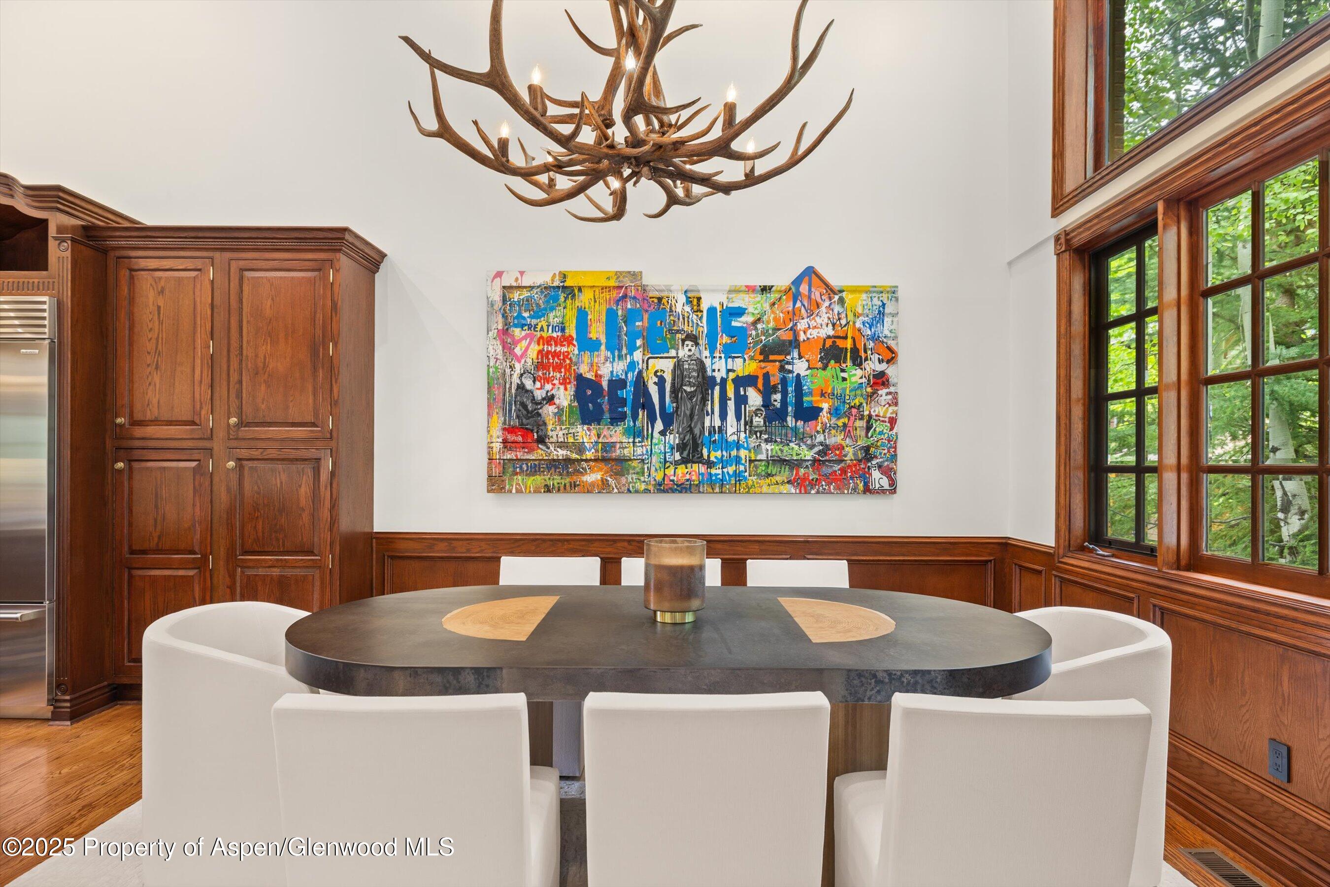 918 South Mill Street, Unit A Aspen, CO 81611 - Photo 8 of 34 a view of a dining area with furniture and a window