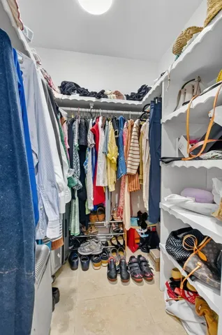 a bedroom with furniture and a couch