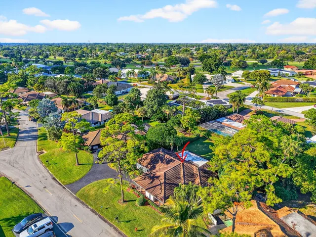 $595,000 | 435 Pine Villa Drive, Atlantis, FL 33462