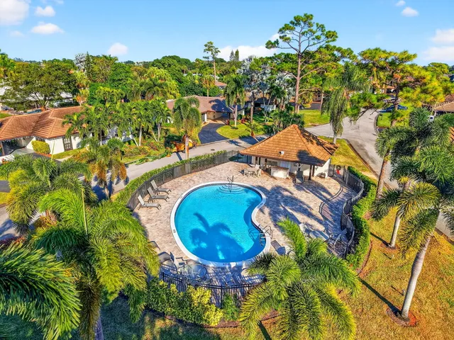 $595,000 | 435 Pine Villa Drive, Atlantis, FL 33462