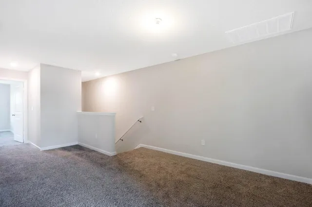 an empty room with an entryway