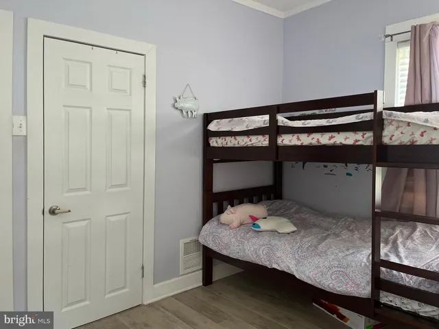 a room with a table and windows