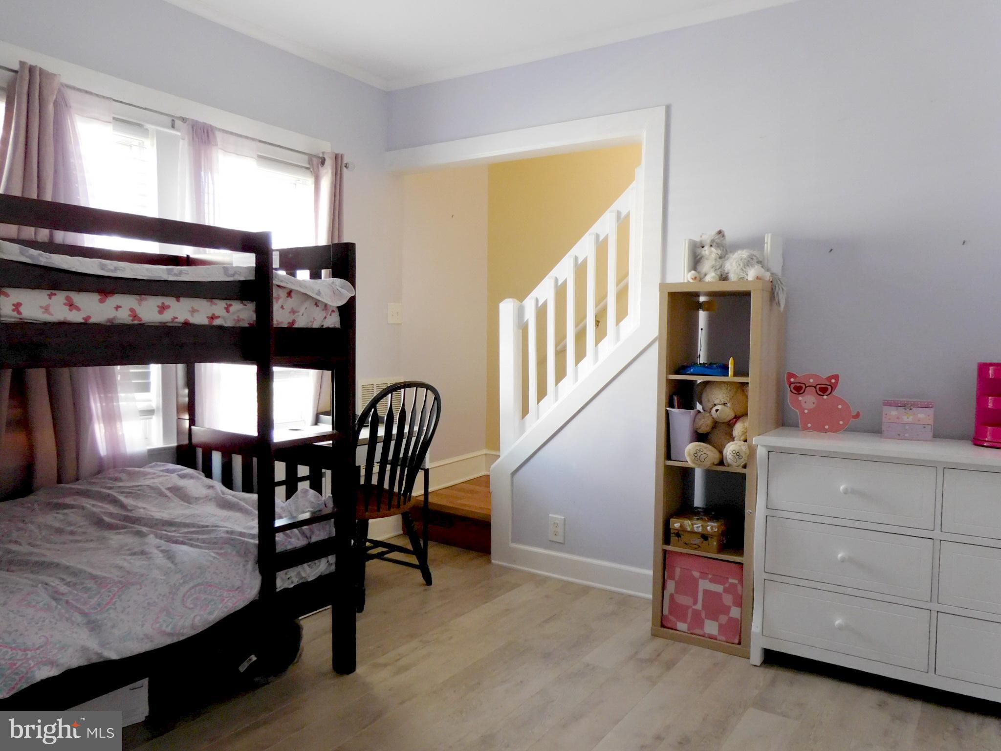 719 Hickory Street Delanco, NJ 08075 - Photo 18 of 29 a bedroom with furniture and a window
