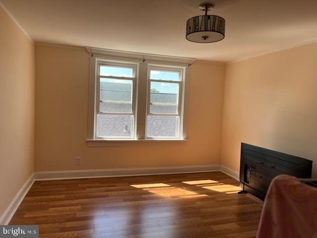 719 Hickory Street Delanco, NJ 08075 - Photo 24 of 29 a view of empty room with wooden floor and fan