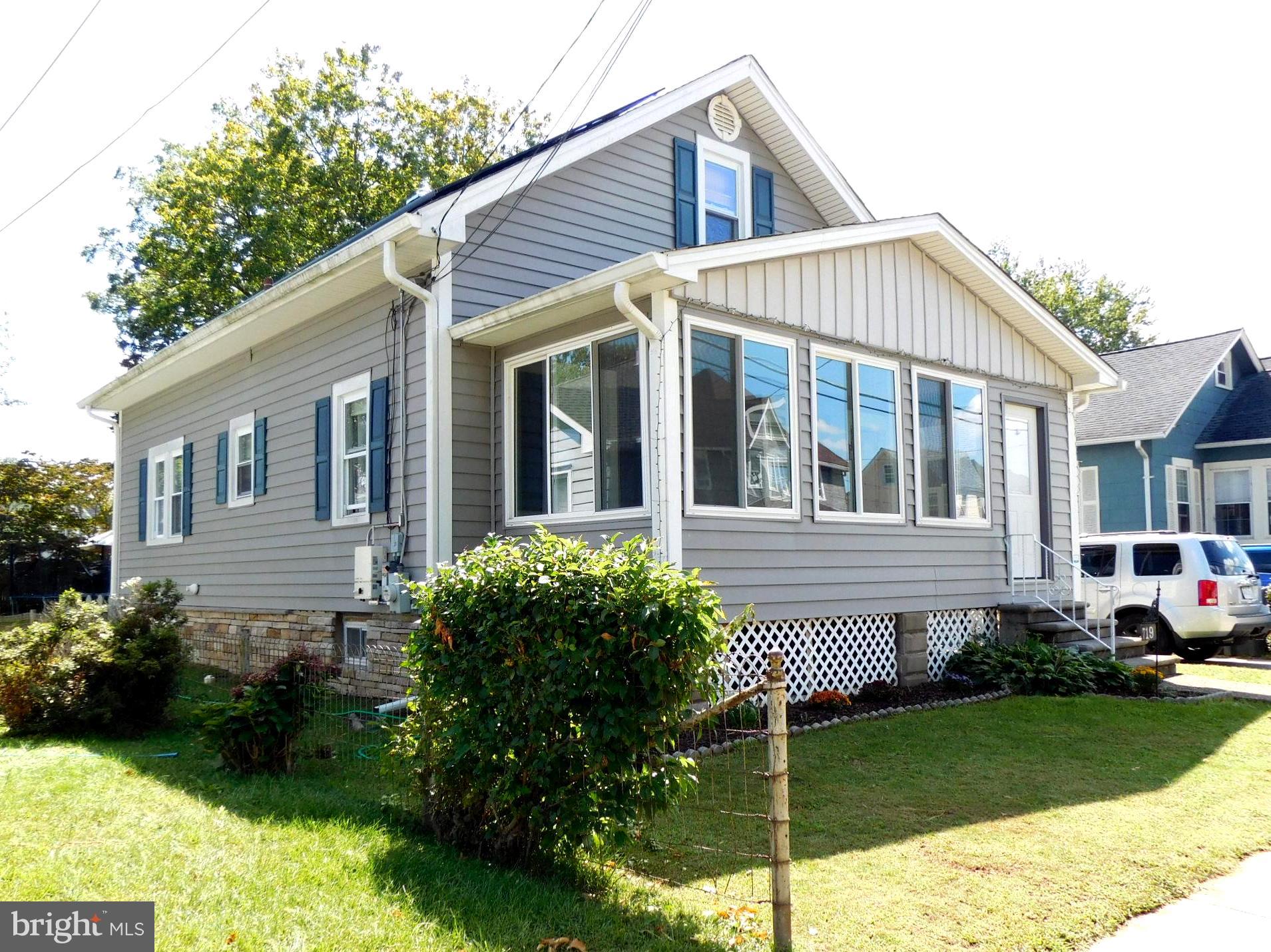 719 Hickory Street Delanco, NJ 08075 - Photo 3 of 29 a view of a house with garden and yard