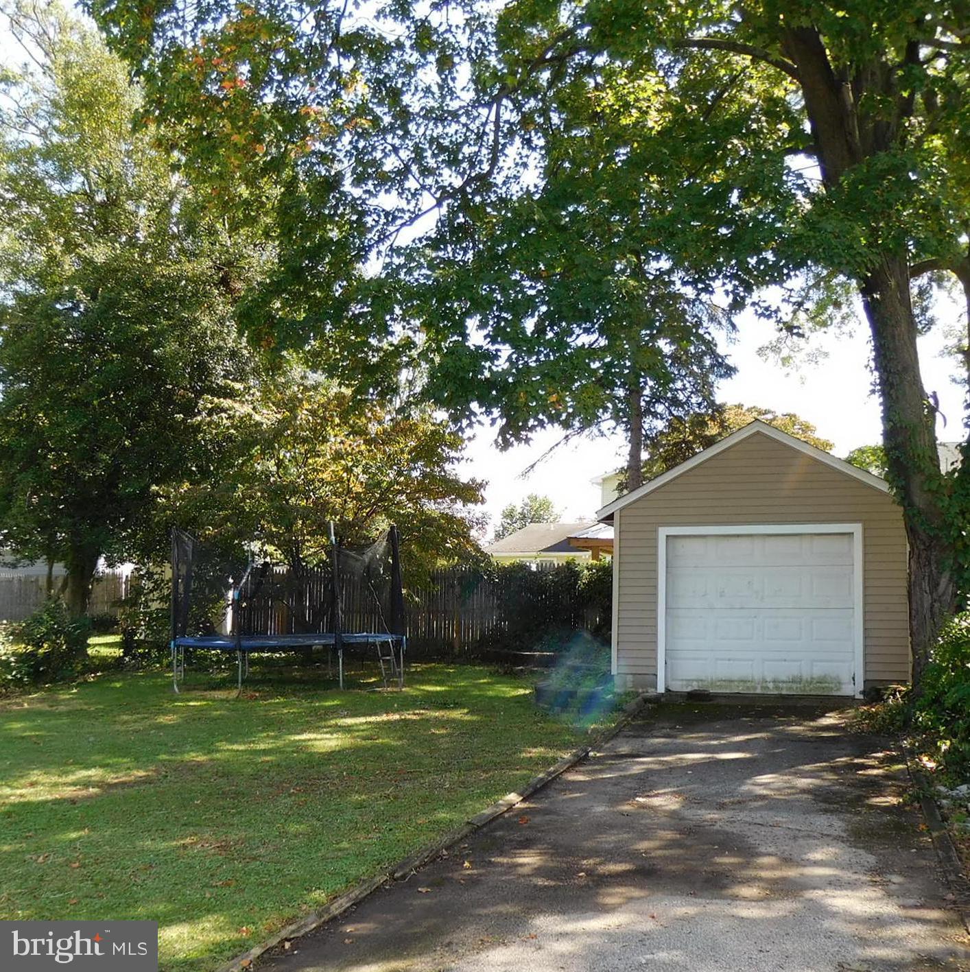 719 Hickory Street Delanco, NJ 08075 - Photo 6 of 29 a front view of a house with a garden