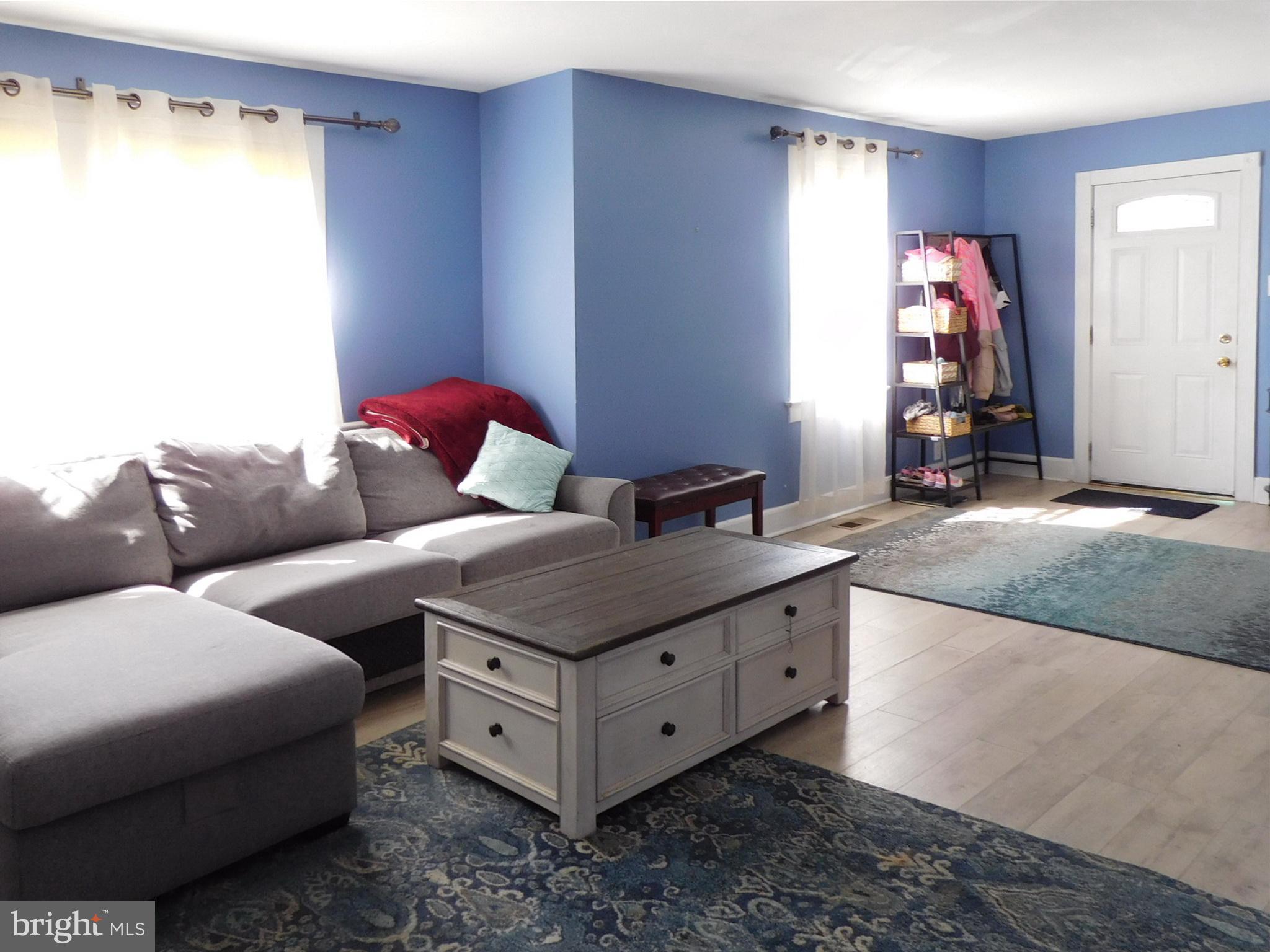 719 Hickory Street Delanco, NJ 08075 - Photo 7 of 29 a living room with furniture and a window