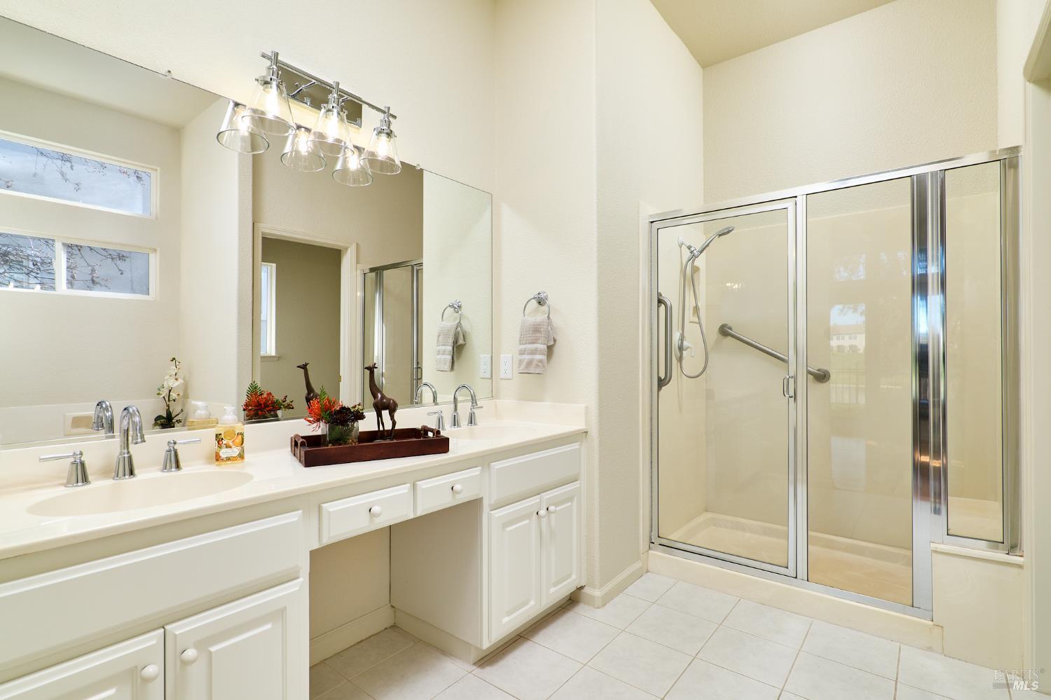 48 Augusta Court Rio Vista, CA 94571 - Photo 19 of 32 a bathroom with a double vanity sink mirror and double
