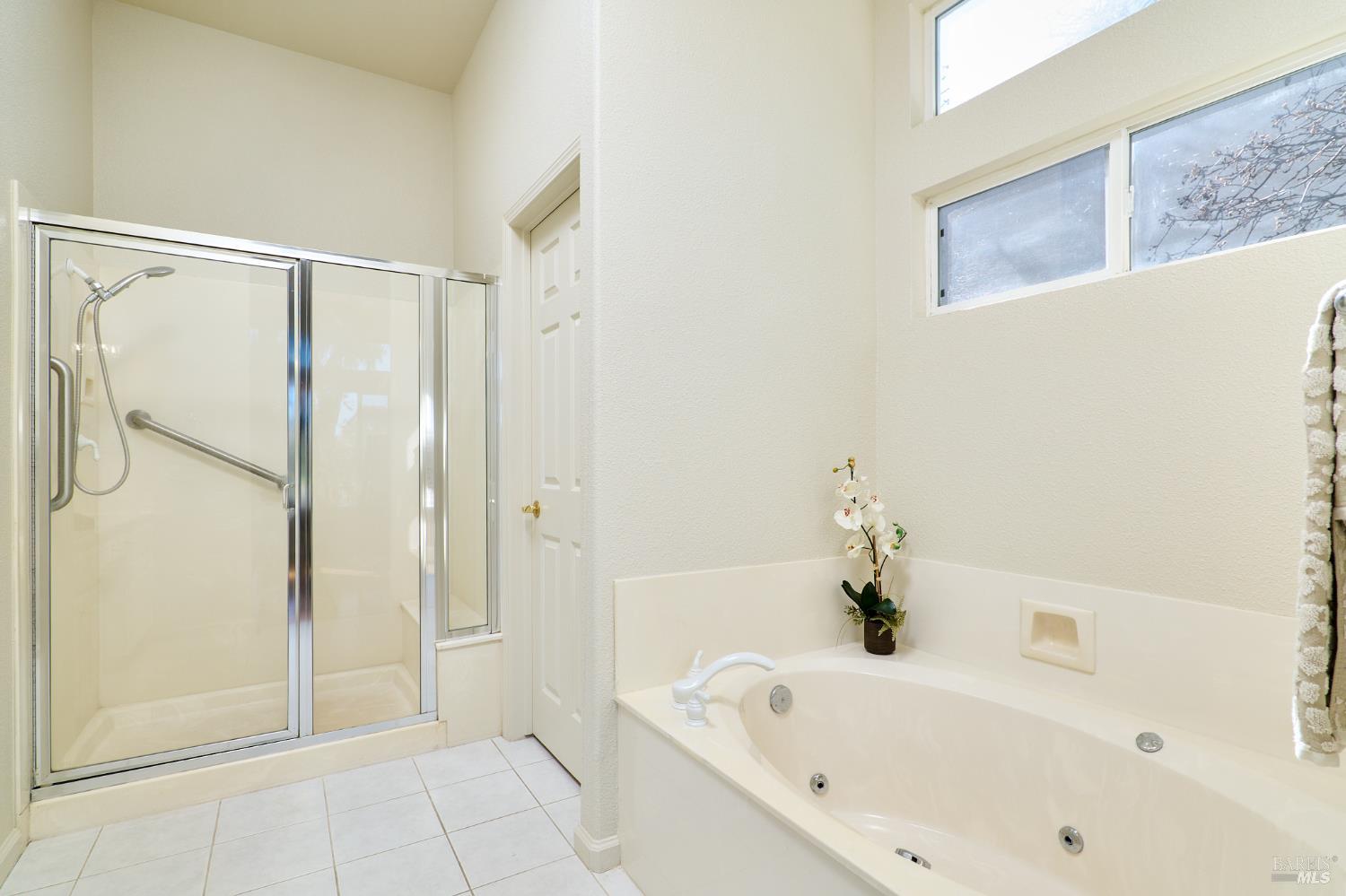 48 Augusta Court Rio Vista, CA 94571 - Photo 20 of 32 a bathroom with a bathtub and a shower