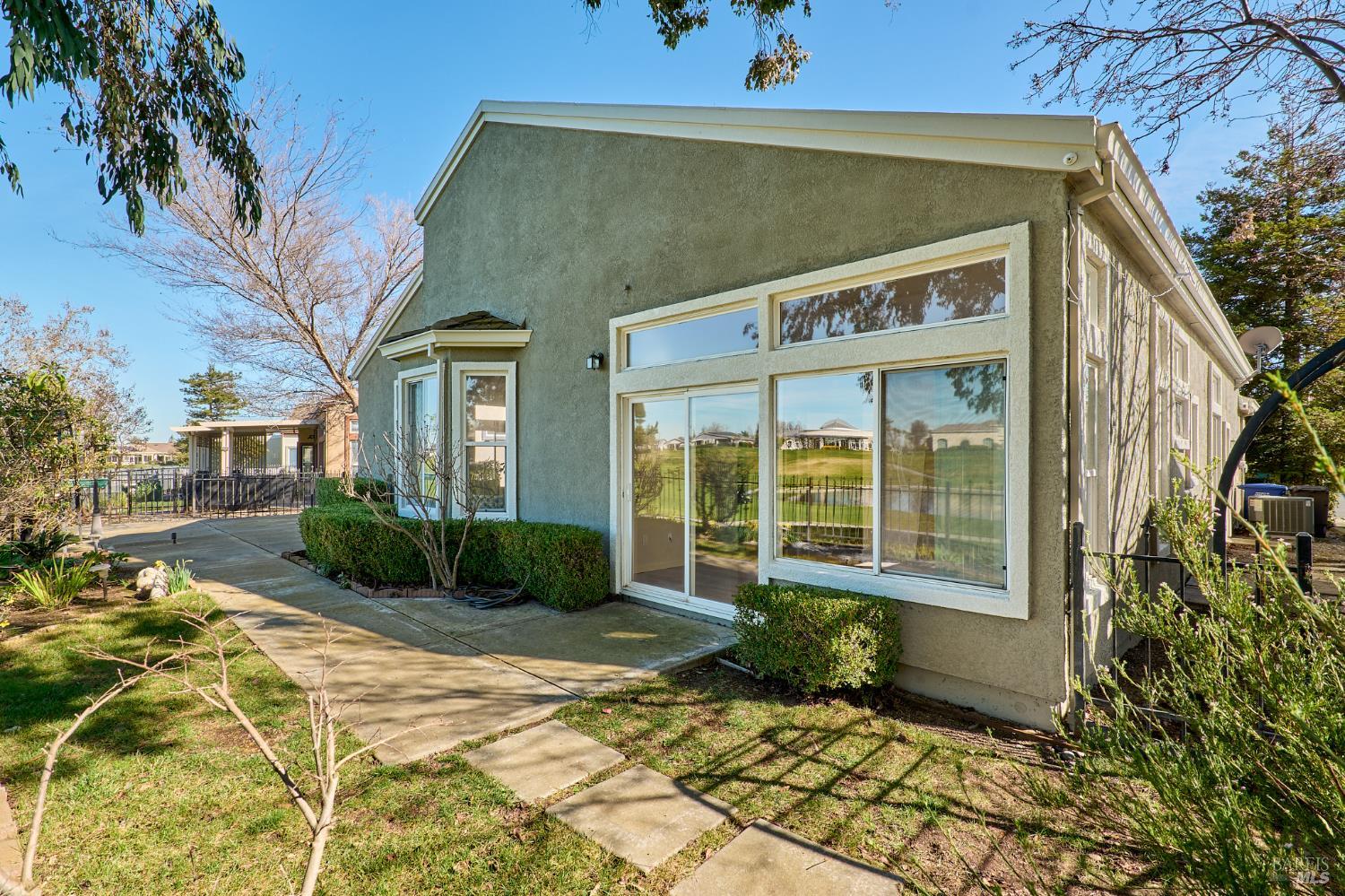 48 Augusta Court Rio Vista, CA 94571 - Photo 30 of 32 a front view of a house with a garden