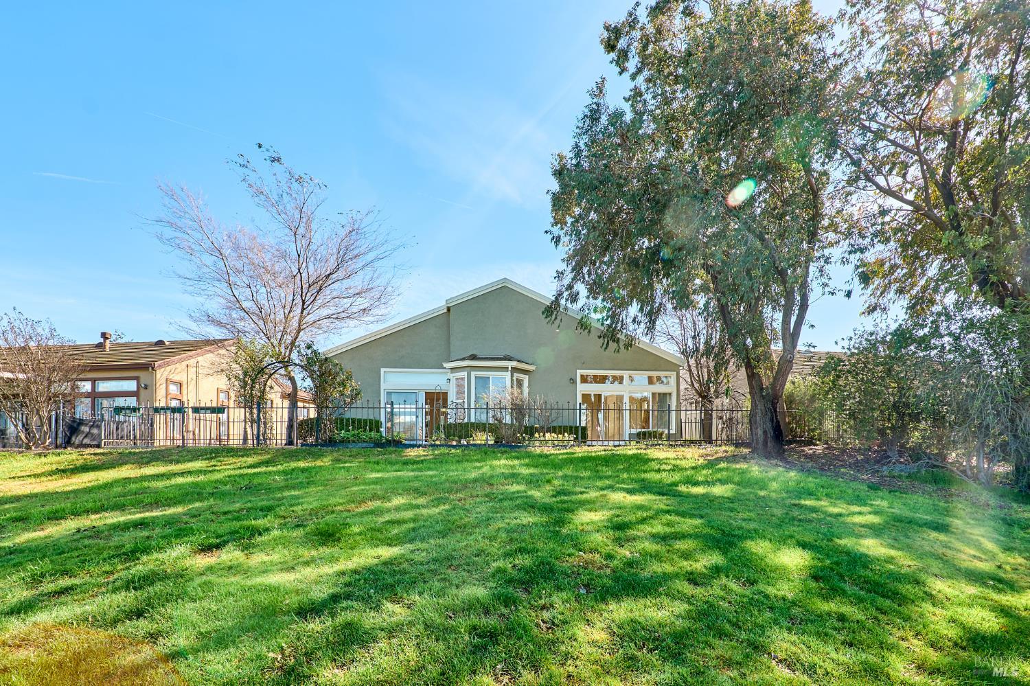 48 Augusta Court Rio Vista, CA 94571 - Photo 32 of 32 a view of a house with a big yard and large trees
