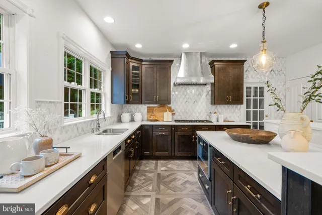 a white bath tub sitting next to a window