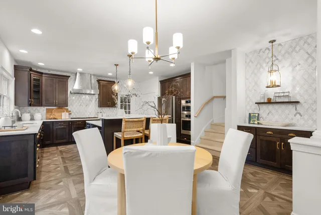 a view of a workspace with furniture