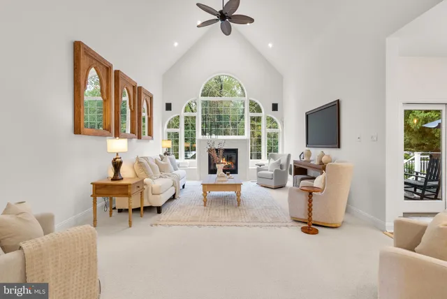 a room with gym equipment and a flat screen tv